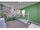 bedroom with a jungle mural and teepee bed at 9228 Forge Breeze Loop Loop, Wesley Chapel, FL 33545