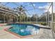 Enjoy this refreshing screened pool and spa at 9232 Brindlewood Dr, Odessa, FL 33556