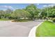 Residential street with lush landscaping at 9232 Brindlewood Dr, Odessa, FL 33556