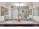 Bathroom with a double vanity and granite countertops at 954 Old Windsor Way, Spring Hill, FL 34609