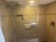 Bathroom with glass shower enclosure and tile surround at 103 Old Mill Pond Rd, Palm Harbor, FL 34683