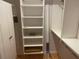 Walk-in closet with shelving and hanging rods at 103 Old Mill Pond Rd, Palm Harbor, FL 34683