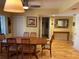 Light and airy dining room with hardwood floors at 103 Old Mill Pond Rd, Palm Harbor, FL 34683