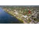 Aerial view highlighting home's waterfront location at 1030 Charles St, Clearwater, FL 33755