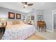 King-size bed, desk, and mirrored closet doors at 1030 Charles St, Clearwater, FL 33755