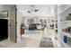 Bright and airy living room with tiled floors and built-in shelving at 1030 Charles St, Clearwater, FL 33755