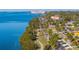 Aerial view of waterfront neighborhood with palm trees and homes at 1030 Charles St, Clearwater, FL 33755