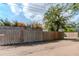 Wooden fence encloses backyard, providing privacy and security at 1039 10Th N St, St Petersburg, FL 33705