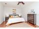 Bright bedroom with king-size bed, hardwood floors, and ample natural light at 1039 10Th N St, St Petersburg, FL 33705