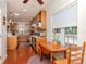 Modern kitchen with island and hardwood floors, open to breakfast nook at 1039 10Th N St, St Petersburg, FL 33705