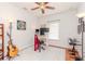 Home office with a desk, keyboard, and guitar at 1039 10Th N St, St Petersburg, FL 33705