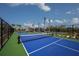 Two pickleball courts with green and blue surfaces at 11822 Starbright Path, Venice, FL 34293