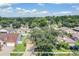 Aerial view of a residential neighborhood showcasing houses with lush landscaping at 122 Orange Bud Way, Plant City, FL 33563