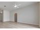 Large living room with ceiling fan and hardwood floors at 122 Orange Bud Way, Plant City, FL 33563