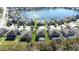 Aerial view of houses near a lake at 12405 Crestridge Loop, New Port Richey, FL 34655