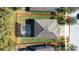 Aerial view of house with pool and screen enclosure at 12405 Crestridge Loop, New Port Richey, FL 34655