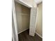 Built-in closet with double doors and wire shelving at 1348 Impatiens Ct, Trinity, FL 34655