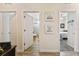 Bright hallway with access to bedrooms and a bathroom at 14638 Strathglass Dr, Hudson, FL 34667