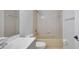 Clean bathroom with a bathtub, toilet and sink at 1542 Mccrea Dr, Lutz, FL 33549