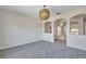 Spacious bedroom with high ceilings and access to upper hallway at 1542 Mccrea Dr, Lutz, FL 33549