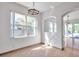 Dining room with granite floors and natural light at 1542 Mccrea Dr, Lutz, FL 33549