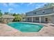 Refreshing pool in backyard of two-story home at 1542 Mccrea Dr, Lutz, FL 33549