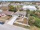 Aerial view of a newly built home with a red door at 15958 Adobe Dr, Hudson, FL 34667