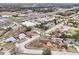 Aerial view of a house in a residential area at 15958 Adobe Dr, Hudson, FL 34667