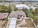 Aerial view of a newly built home with a red door at 15958 Adobe Dr, Hudson, FL 34667