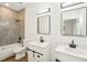 Modern bathroom with double vanity and updated fixtures at 15958 Adobe Dr, Hudson, FL 34667