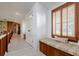 A built-in window seat adds charm to this hallway at 18029 Lake Reflections Blvd, Lutz, FL 33558