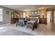 Main bedroom with hardwood floors, fireplace, and large windows at 18029 Lake Reflections Blvd, Lutz, FL 33558