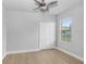 Bright bedroom with double door closet and large window at 18058 Turning Leaf Cir, Land O Lakes, FL 34638