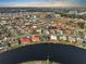 Wide aerial view of neighborhood near a lake at 1809 Wolf Laurel Dr, Sun City Center, FL 33573