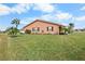 Side view of a single-story house with a neat lawn at 1809 Wolf Laurel Dr, Sun City Center, FL 33573