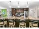 Spacious kitchen boasting granite countertops and pendant lighting at 1809 Wolf Laurel Dr, Sun City Center, FL 33573