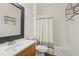 Bathroom with shower/tub, vanity, and updated fixtures at 18402 Bridle Club Dr # 18402, Tampa, FL 33647