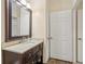 Simple bathroom with vanity and large mirror at 18402 Bridle Club Dr # 18402, Tampa, FL 33647