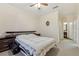 Bright bedroom with a queen-size bed and ensuite bathroom access at 18402 Bridle Club Dr # 18402, Tampa, FL 33647