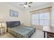 Spacious bedroom with a queen bed and plenty of natural light at 18402 Bridle Club Dr # 18402, Tampa, FL 33647