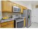 Modern kitchen with stainless steel appliances and granite countertops at 18402 Bridle Club Dr # 18402, Tampa, FL 33647