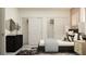 Bedroom with dark gray bed, nightstands, and closet at 18412 Serene Lake Loop, Lutz, FL 33548