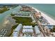 Aerial view of coastal community near the beach with water access at 19915 Gulf Blvd # 303, Indian Shores, FL 33785