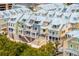 Aerial view of a community of charming townhouses with metal roofs at 19915 Gulf Blvd # 303, Indian Shores, FL 33785