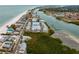 Aerial view of beachfront property and neighborhood at 19915 Gulf Blvd # 303, Indian Shores, FL 33785