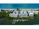 Luxury waterfront property with private boat docks and beach access at 19915 Gulf Blvd # 303, Indian Shores, FL 33785