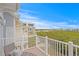 Private balcony overlooking tranquil water views at 19915 Gulf Blvd # 303, Indian Shores, FL 33785