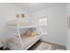 bedroom with a white bunk bed and playful decor at 19915 Gulf Blvd # 303, Indian Shores, FL 33785