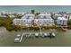 Aerial view of community with a waterfront and boat slips at 19915 Gulf Blvd # 303, Indian Shores, FL 33785