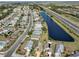 Wide aerial view of the community and surrounding area at 243 Linger Ln, Sun City Center, FL 33573